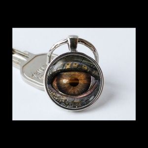 “Ancient Eyes” Cabochon Pendant Keychain in Silver